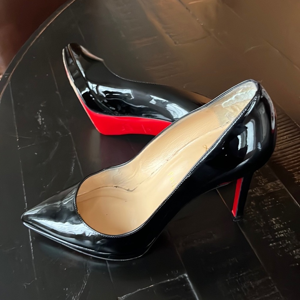 Black stiletto shoes from Christian Louis Vuitton